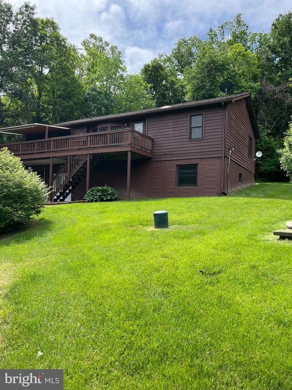 400 Fork River Rd N, Shenandoah, VA 22849 - back of house featuring a deck, stairway, and a yard