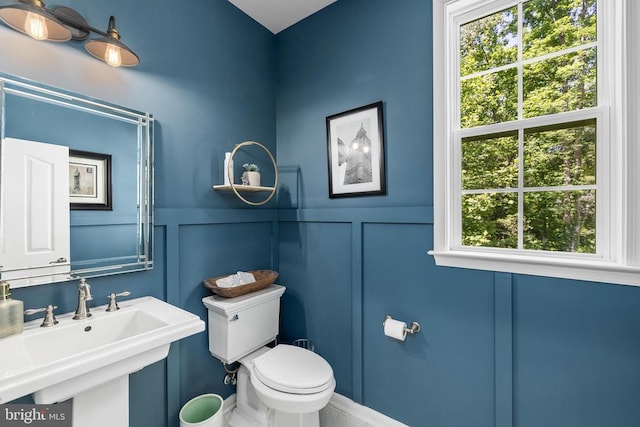 11219 Kailee Ln, Spotsylvania, VA 22553 - bathroom with a decorative wall and toilet