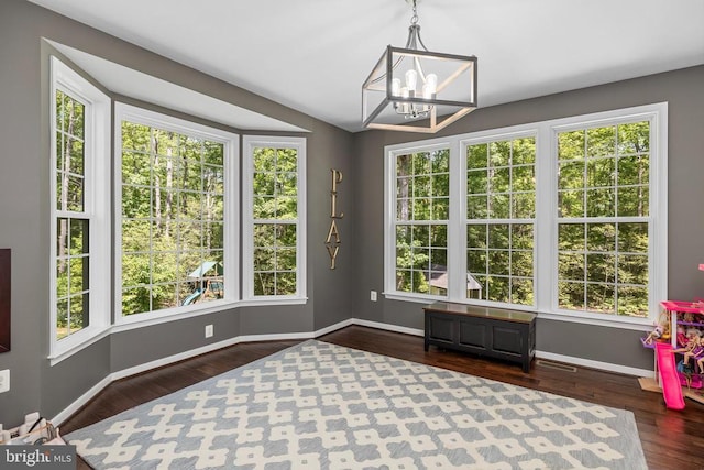 11219 Kailee Ln, Spotsylvania, VA 22553 - unfurnished room with a chandelier and dark wood-style floors
