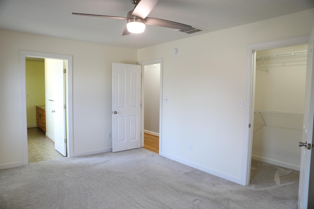 182 Henkel Rd, Waynesboro, VA 22980 - unfurnished bedroom with a spacious closet, carpet flooring, a closet, and baseboards