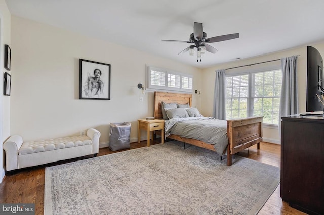 52 N St, Warrenton, VA 20186 - bedroom with wood finished floors, baseboards, and ceiling fan