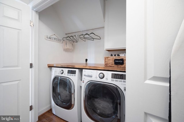 52 N St, Warrenton, VA 20186 - washroom with washer and clothes dryer and wood finished floors