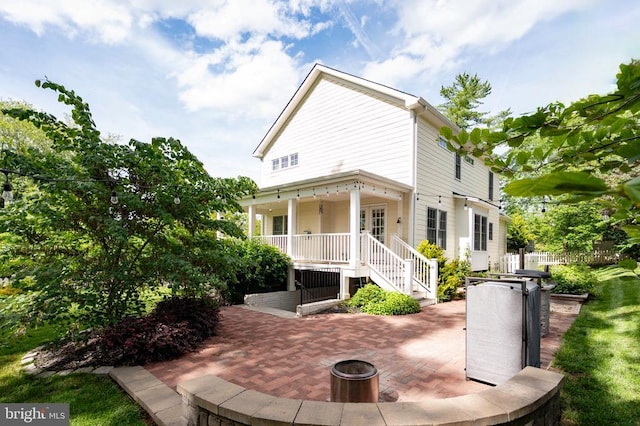 52 N St, Warrenton, VA 20186 - view of front of property featuring a patio area and a fire pit