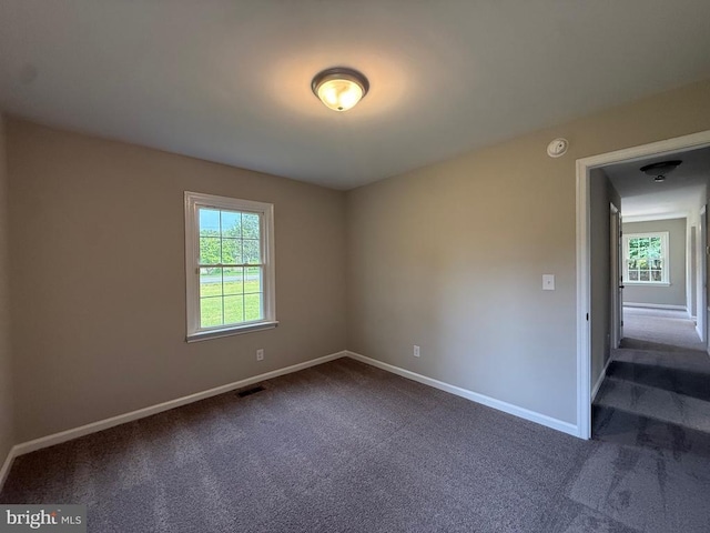 319 Chopping Rd, Mineral, VA 23117 - spare room with dark colored carpet and a smoke detector