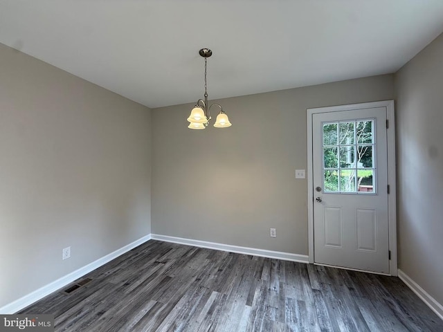 319 Chopping Rd, Mineral, VA 23117 - unfurnished dining area featuring dark wood finished floors and a chandelier