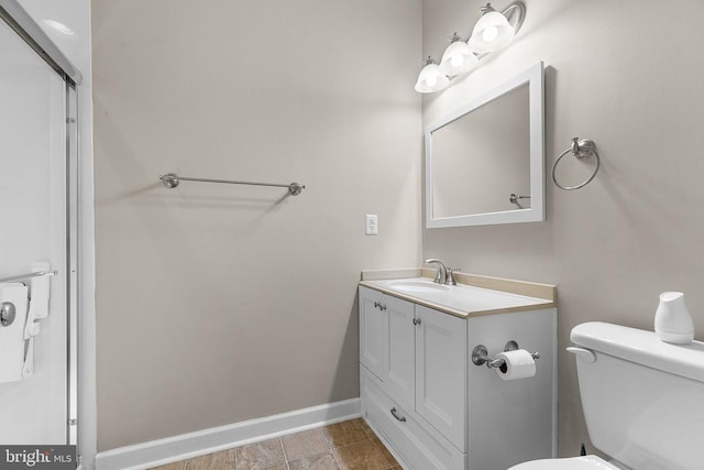  - bathroom with vanity and baseboards