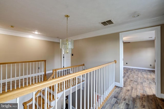 369 Eldon Yates Dr, Stanley, VA 22851 - corridor featuring wood finished floors, crown molding, a chandelier, recessed lighting, and an upstairs landing