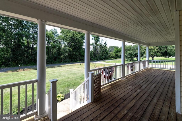369 Eldon Yates Dr, Stanley, VA 22851 - wooden porch featuring a yard and view of scattered trees