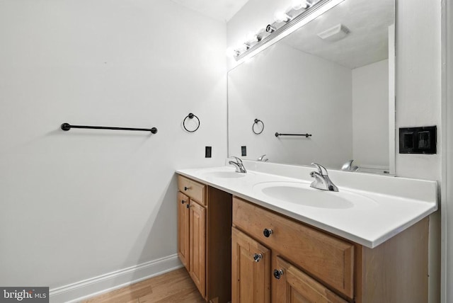 369 Eldon Yates Dr, Stanley, VA 22851 - full bathroom with double vanity and wood finished floors