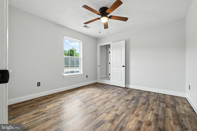 369 Eldon Yates Dr, Stanley, VA 22851 - spare room with wood finished floors and a ceiling fan