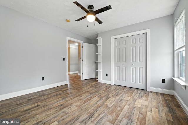369 Eldon Yates Dr, Stanley, VA 22851 - unfurnished bedroom with wood finished floors, a closet, and ceiling fan
