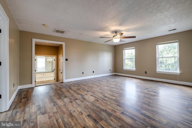 369 Eldon Yates Dr, Stanley, VA 22851 - spare room with ceiling fan, a textured ceiling, and wood finished floors