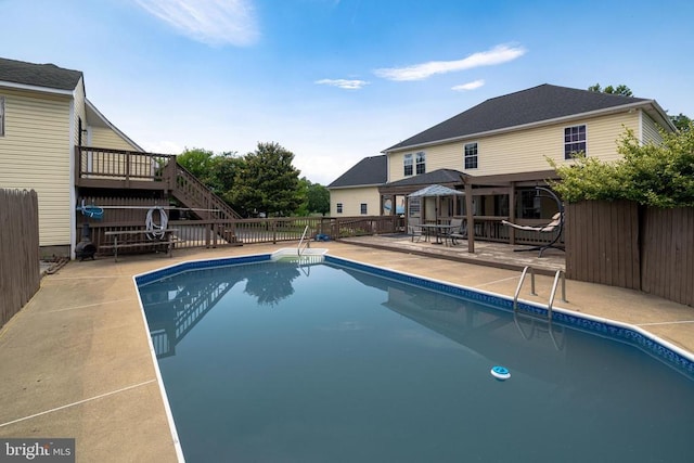 369 Eldon Yates Dr, Stanley, VA 22851 - view of swimming pool with a fenced backyard, a patio area, stairway, and a deck