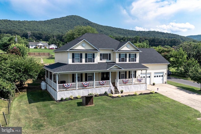 369 Eldon Yates Dr, Stanley, VA 22851 - view of front of home featuring covered porch, a mountain view, driveway, and a garage