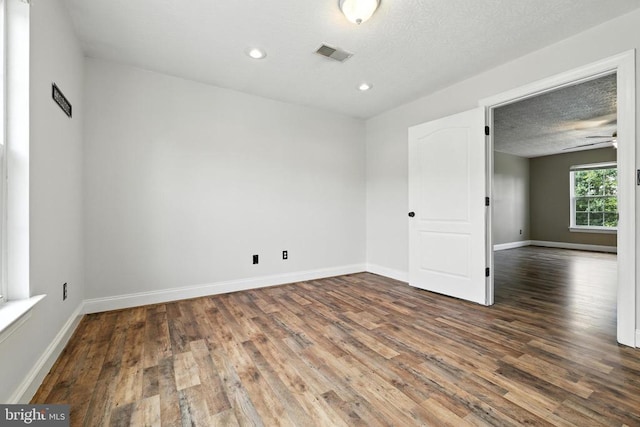 369 Eldon Yates Dr, Stanley, VA 22851 - empty room with wood finished floors, recessed lighting, ceiling fan, and a textured ceiling