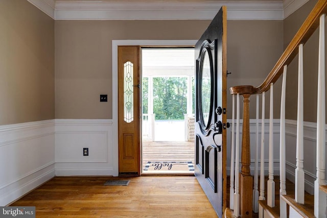 369 Eldon Yates Dr, Stanley, VA 22851 - entryway featuring stairway, light wood-style floors, wainscoting, and ornamental molding