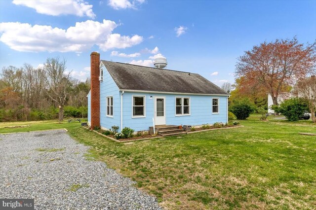 8952 Courthouse Rd, Spotsylvania, VA 22553 - view of front facade with a chimney and a front lawn