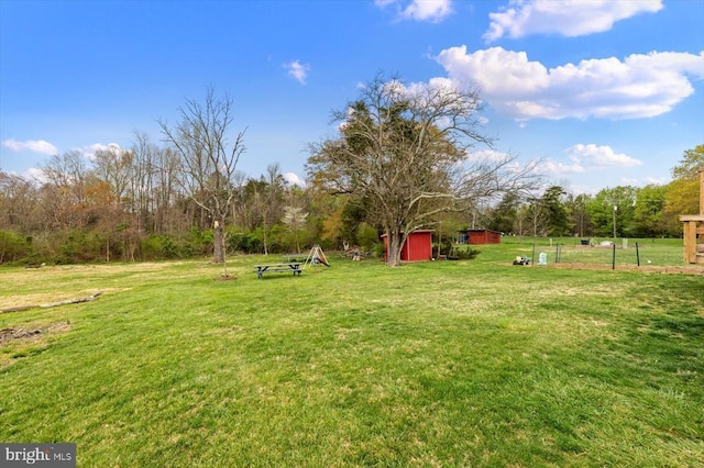 8952 Courthouse Rd, Spotsylvania, VA 22553 - view of grassy yard with a storage unit and an outdoor structure