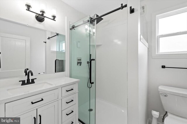 8952 Courthouse Rd, Spotsylvania, VA 22553 - full bath with healthy amount of natural light, a stall shower, toilet, and vanity