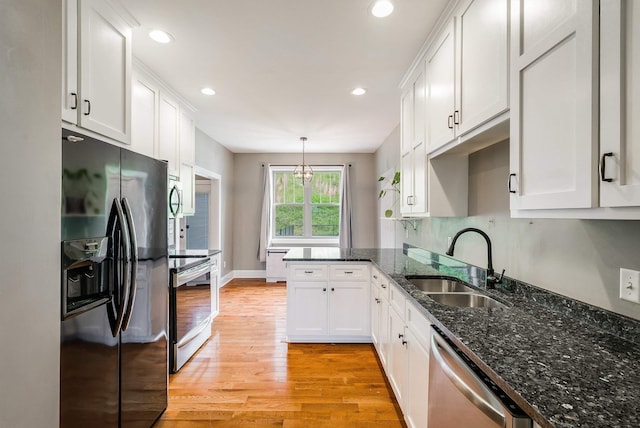 17 Mcilwee Ln, Staunton, VA 24401 - kitchen featuring stainless steel appliances, a sink, white cabinetry, light wood-style flooring, and recessed lighting
