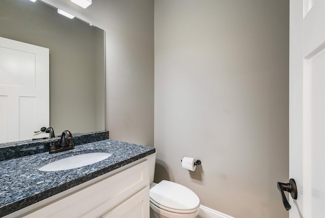 17 Mcilwee Ln, Staunton, VA 24401 - half bathroom featuring vanity, toilet, and baseboards