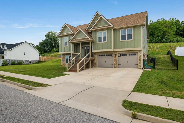 17 Mcilwee Ln, Staunton, VA 24401 - raised ranch with board and batten siding, stone siding, an attached garage, concrete driveway, and a shingled roof
