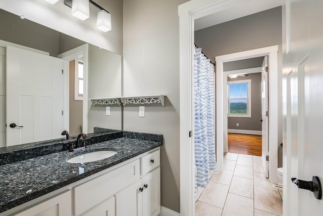 17 Mcilwee Ln, Staunton, VA 24401 - bathroom with vanity, baseboards, tile patterned flooring, and toilet