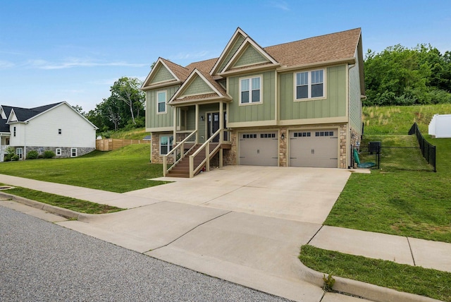17 Mcilwee Ln, Staunton, VA 24401 - raised ranch featuring board and batten siding, stone siding, an attached garage, concrete driveway, and roof with shingles