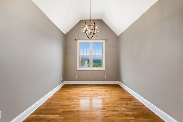 17 Mcilwee Ln, Staunton, VA 24401 - spare room with a chandelier, light wood-type flooring, baseboards, and lofted ceiling