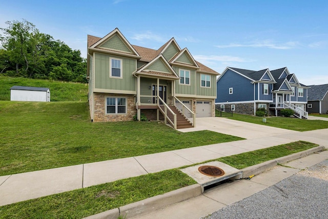 17 Mcilwee Ln, Staunton, VA 24401 - view of front facade with stone siding, board and batten siding, driveway, and a garage