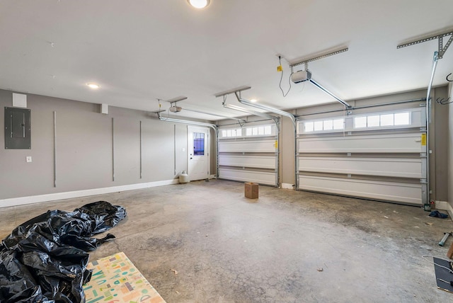 17 Mcilwee Ln, Staunton, VA 24401 - garage featuring electric panel, a garage door opener, and baseboards