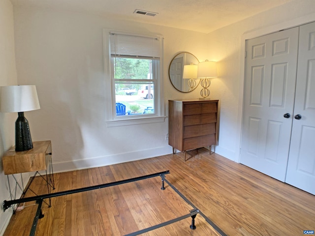239 Shamrock Rd, Charlottesville, VA 22903 - bedroom with wood finished floors, baseboards, and a closet