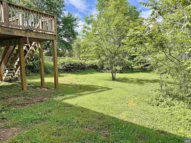 239 Shamrock Rd, Charlottesville, VA 22903 - view of green lawn with a deck and stairway
