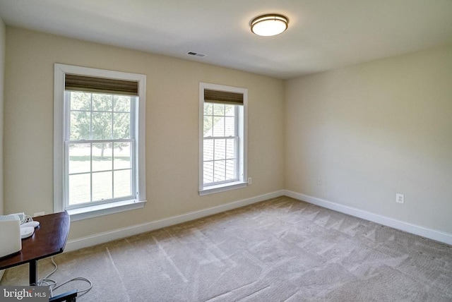 12400 Eustace Dr, Bumpass, VA 23024 - carpeted spare room featuring baseboards, plenty of natural light, and an office area