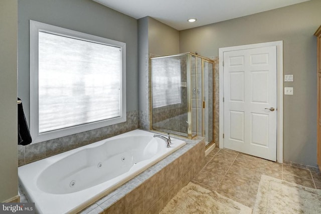 12400 Eustace Dr, Bumpass, VA 23024 - bathroom featuring a stall shower, a tub with jets, and tile patterned flooring