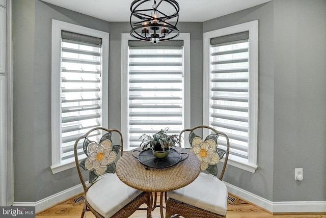 12400 Eustace Dr, Bumpass, VA 23024 - dining space with a chandelier, baseboards, and healthy amount of natural light