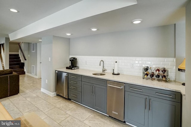 12400 Eustace Dr, Bumpass, VA 23024 - indoor wet bar with fridge, decorative backsplash, stairs, dishwasher, and light tile patterned floors