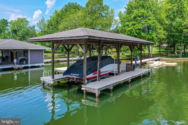 12400 Eustace Dr, Bumpass, VA 23024 - dock area with boat lift, a water view, and view of wooded area