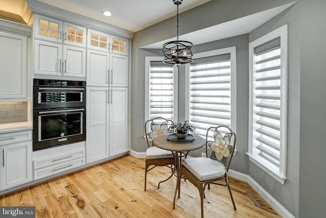 12400 Eustace Dr, Bumpass, VA 23024 - kitchen featuring a chandelier, baseboards, double oven, plenty of natural light, and recessed lighting