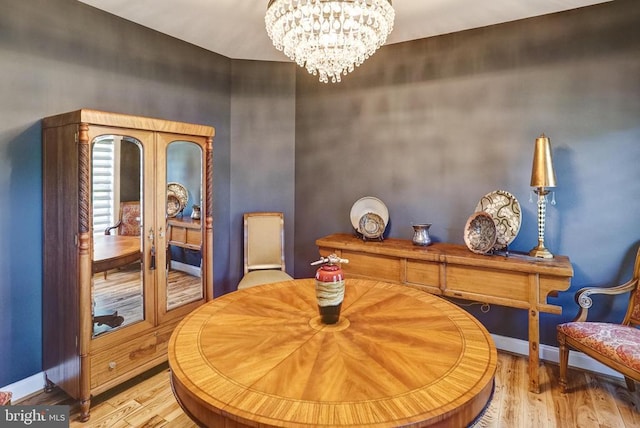 12400 Eustace Dr, Bumpass, VA 23024 - dining space with a chandelier, wood finished floors, and baseboards
