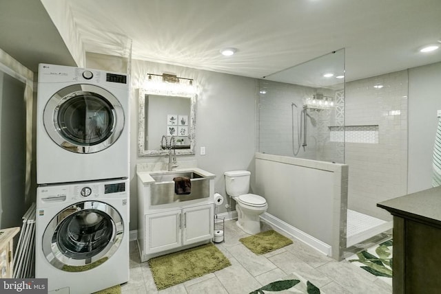 12400 Eustace Dr, Bumpass, VA 23024 - full bathroom featuring estacked washer and dryer, walk in shower, toilet, recessed lighting, and vanity