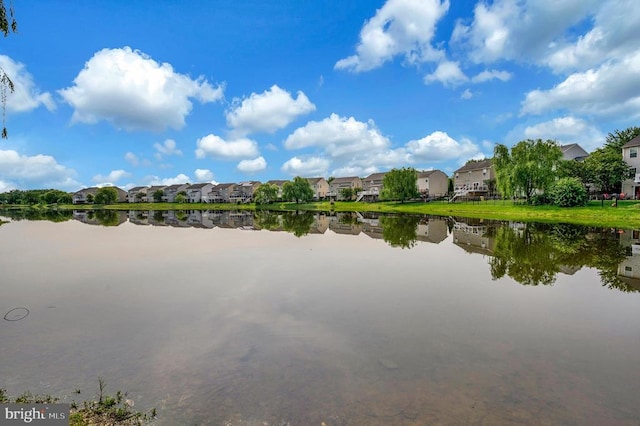  - water view with nearby suburban area