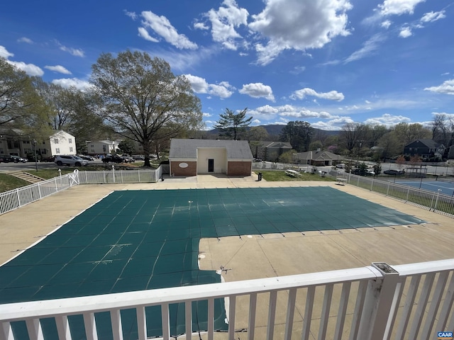 1520 Villa Ter Unit F, Charlottesville, VA 22903 - community pool with a patio, fence, and a residential view