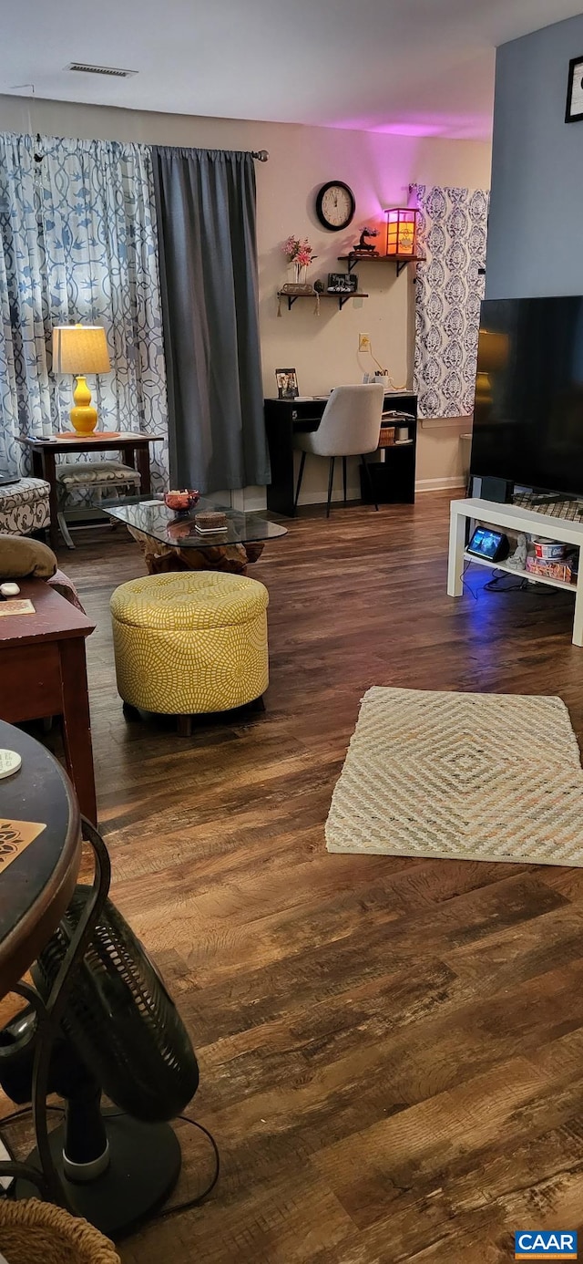 1520 Villa Ter Unit F, Charlottesville, VA 22903 - living area with visible vents and wood finished floors