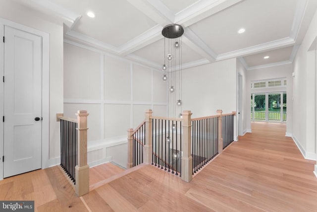 Richards Ferry Rd, Richardsville, VA 22736 - hallway featuring an upstairs landing, wood finished floors, beamed ceiling, crown molding, and a decorative wall