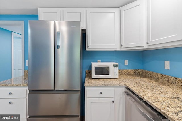 236 Laurel Dr, Madison, VA 22727 - kitchen featuring stainless steel appliances, white cabinetry, and light stone counters