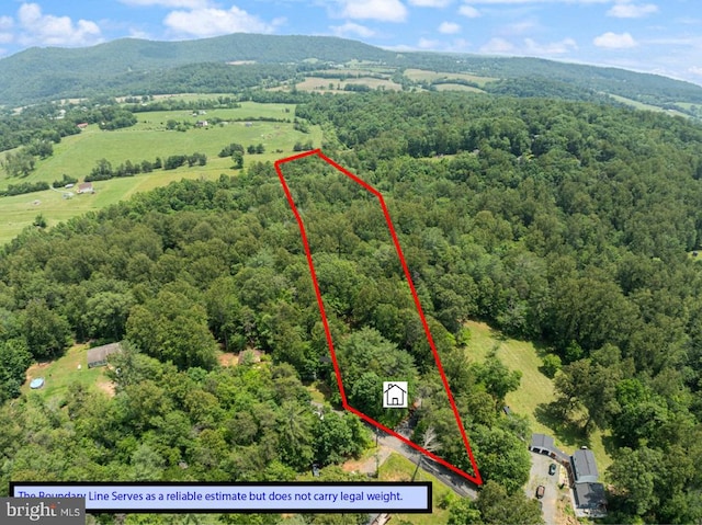 236 Laurel Dr, Madison, VA 22727 - aerial view of property and surrounding area with a heavily wooded area and property parcel outlined