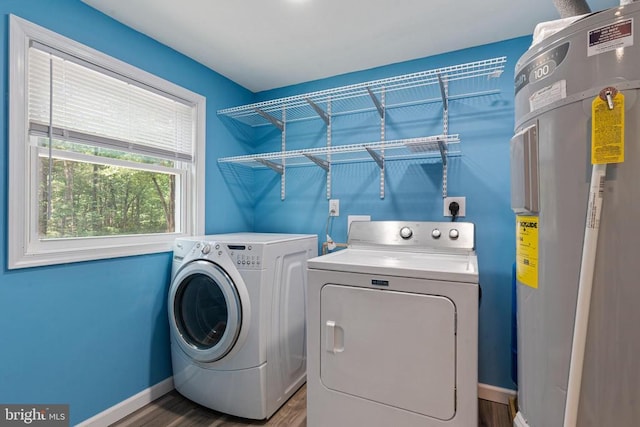 236 Laurel Dr, Madison, VA 22727 - laundry room with electric water heater, washing machine and clothes dryer, and dark wood finished floors