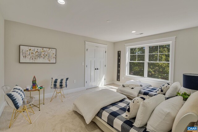 carpeted bedroom featuring visible vents, baseboards, and recessed lighting