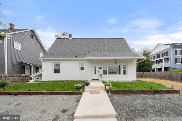 79 Shirley Ave E, Warrenton, VA 20186 - view of front facade with brick siding, a chimney, and roof with shingles
